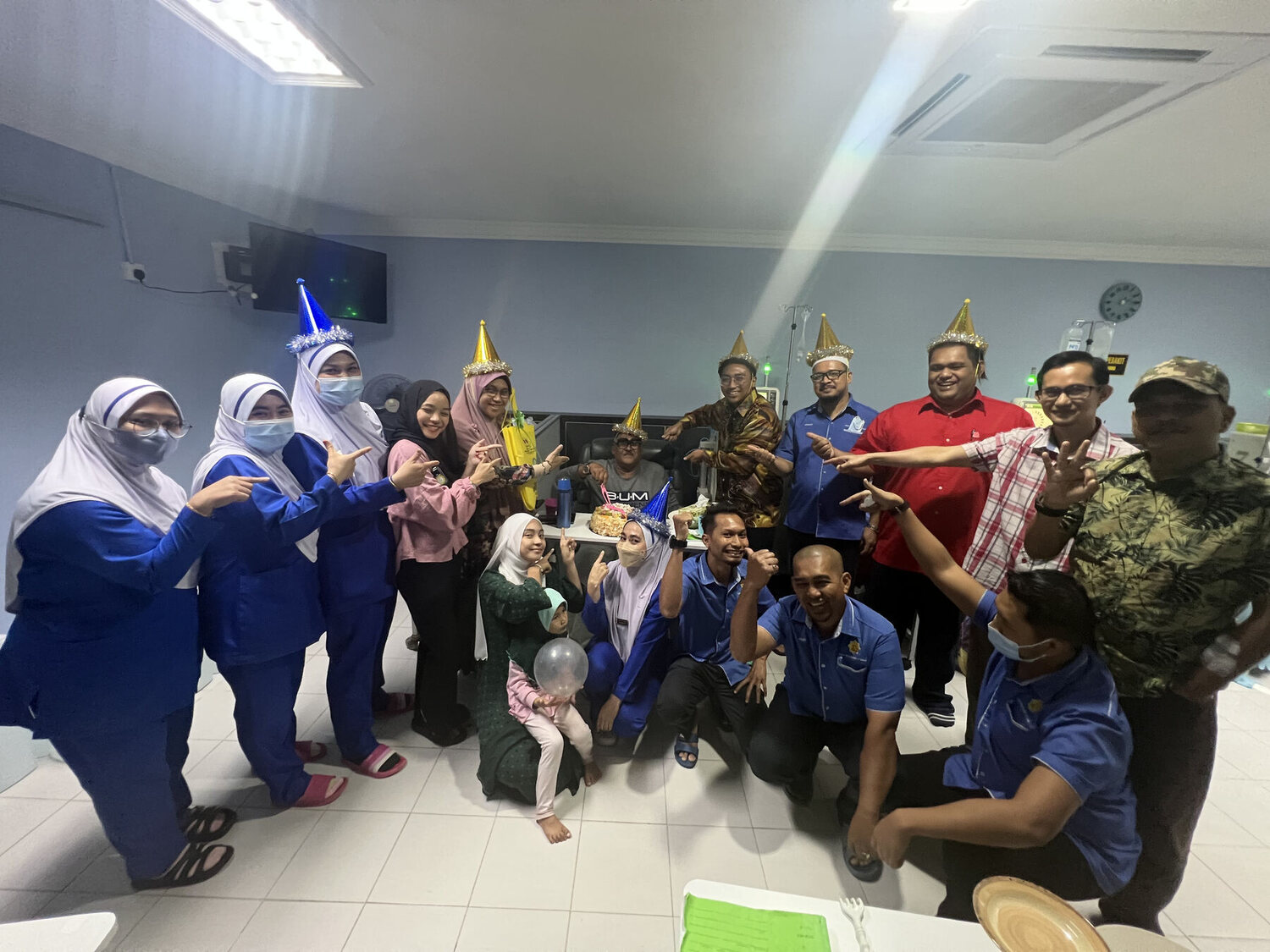 Staff, patients and families celebrating together